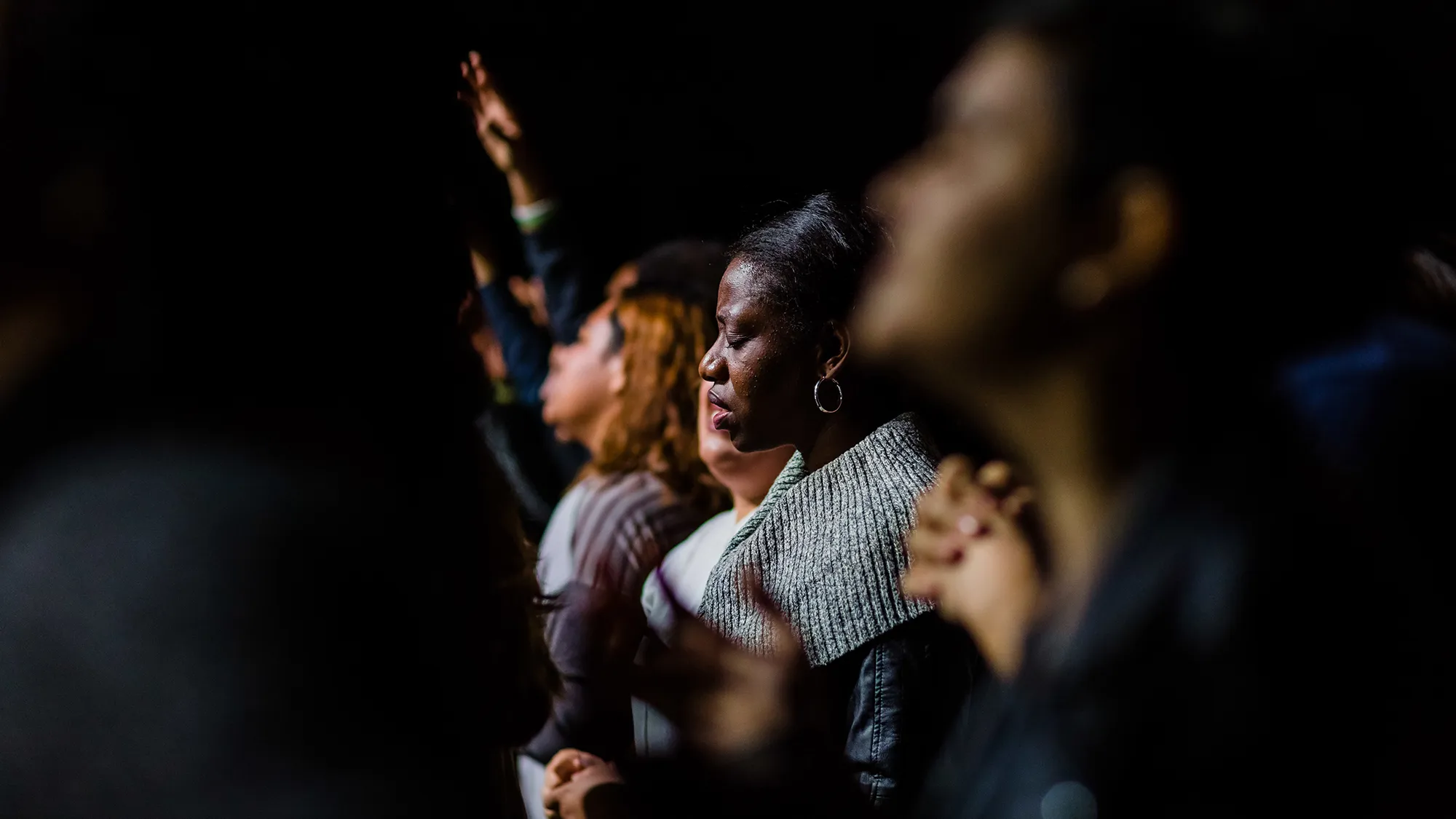 People hugging at church
